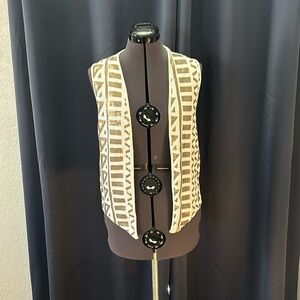 Women’s white and gold open vest